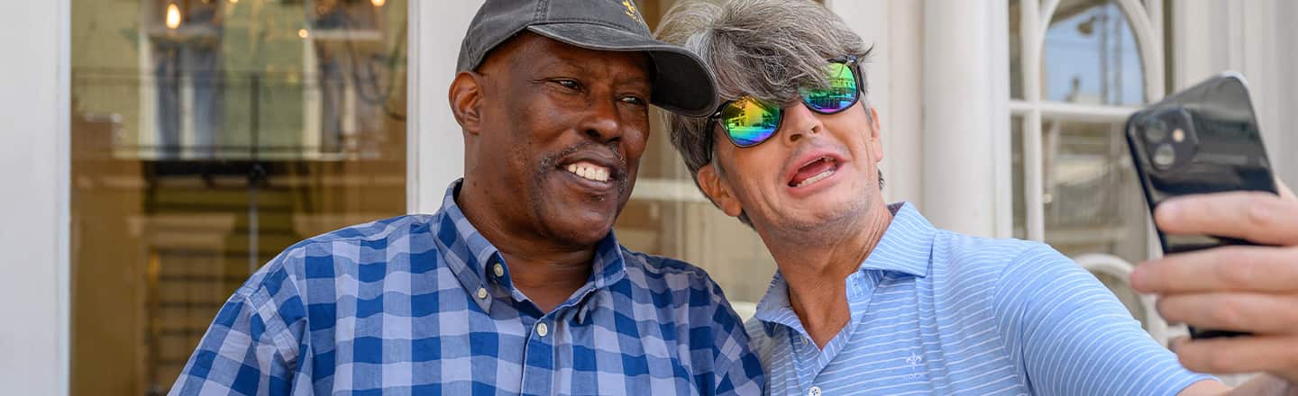 Two men posing for a selfie.